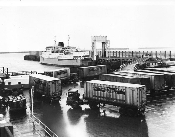 Guy J4s, Ford E4 & buses in background
